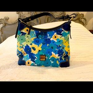Blue floral Dooney & Burke shoulder bag.